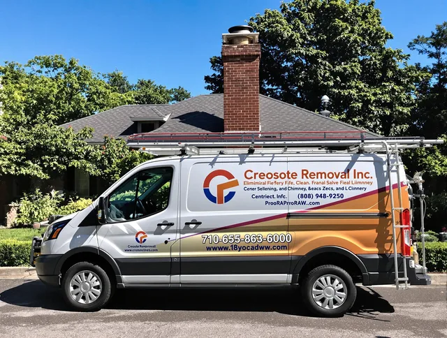 Milford Chimney Sweep technician removing creosote safely in Milford, CT